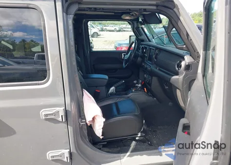 2023 Jeep Wrangler 4Xe Sahara 4X4 z USA, uszkodzony, nr VIN 1C4JJXP64PW568165